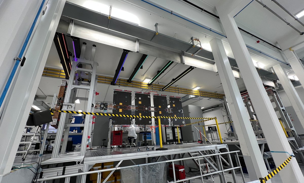 SpaceTech clean room multi-hinge solar array deployment