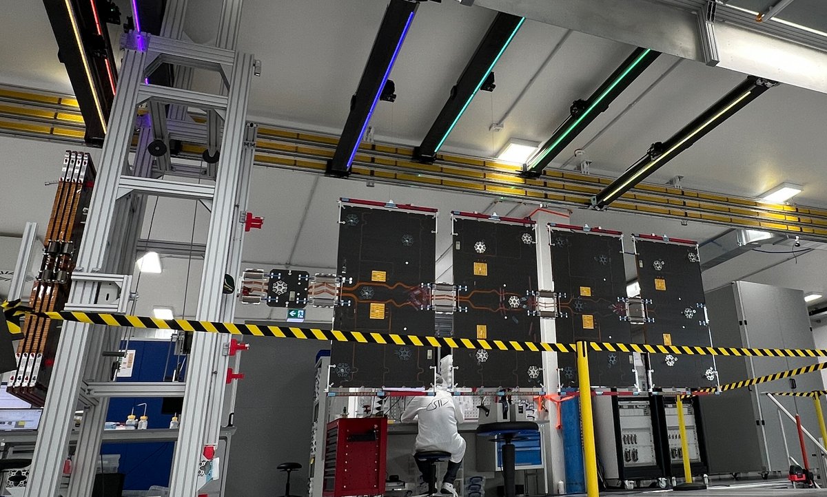 SpaceTech clean room multi-hinge solar array deployment test with zero g robot