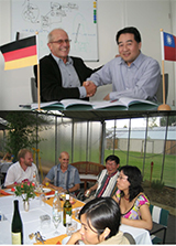 Bernhard Doll signing the contract and signature ceremony with the Taiwanese customers in greenhouse